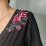 Black dress with a neckline Image 3