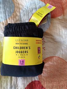 Brand new with tag twin pack of boys joggers 5 to 6 years