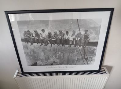 Skyscraper and afternoon framed pictures