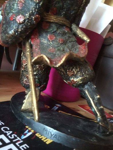 A fine bronze of a samurai signed  MIYAO