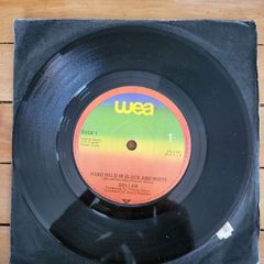 Dollar Hand Held In Black And White 7 inch Vinyl Single 1981 WEA BUCK 1
