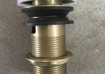 Brushed brass pop up plug & waste