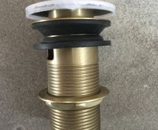Brushed brass pop up plug & waste