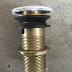 Brushed brass pop up plug & waste