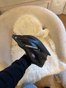 Base camp bike helmet with working safety light