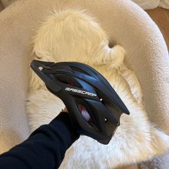 Base camp bike helmet with working safety light