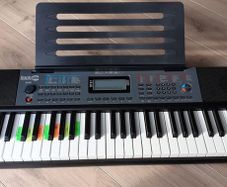 RockJam 61 Key Keyboard Piano with Pitch Bend, Power Supply, Sheet Music Stand, Piano Note Stickers & Simply Piano Lessons
