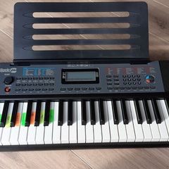 RockJam 61 Key Keyboard Piano with Pitch Bend, Power Supply, Sheet Music Stand, Piano Note Stickers & Simply Piano Lessons