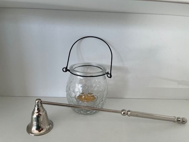 Metal Handle Candle Snuffer. Silver Finish. Moveable Head. With Hanging Tea Light. In Excellent Condition.