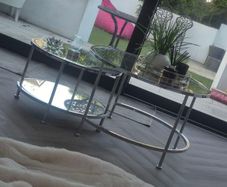 glass  and silver round  coffee table