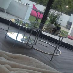 glass  and silver round  coffee table