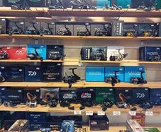 Fishing bait rods lines reels waders lures feeds jackets boxes rod holders and other fishing gear