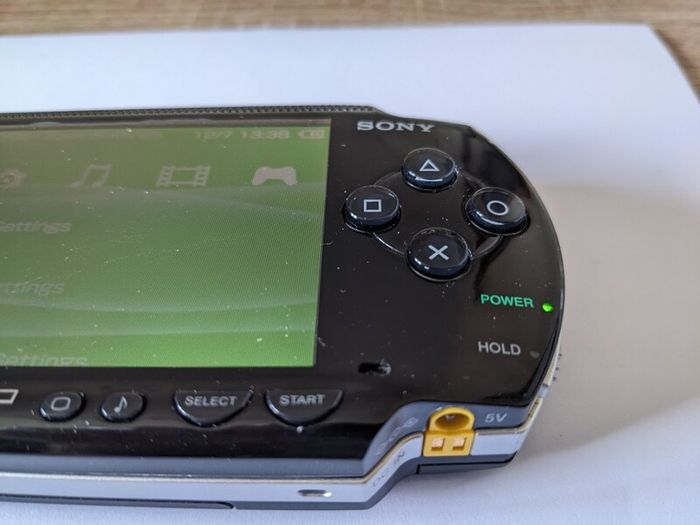PSP original console with charger and battery