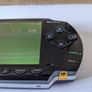 PSP original console with charger and battery Image 5
