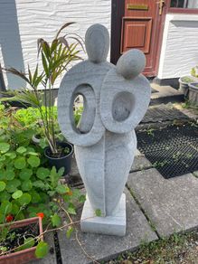 Abstract Stone Statue of Embracing Couple