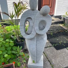 Abstract Stone Statue of Embracing Couple