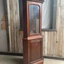 A tall mahogany corner cabinet. Image 6