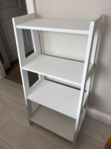 White ladder storage unit