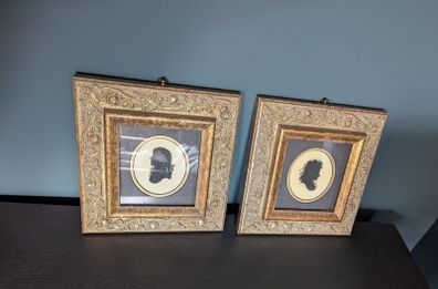 Pair of vintage silhouette portraits in ornate gold frames