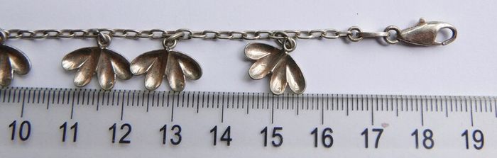Vintage 925 Sterling Silver charm bracelet with flower charms