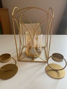 Candle holder with two side candle holders