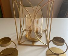 Candle holder with two side candle holders