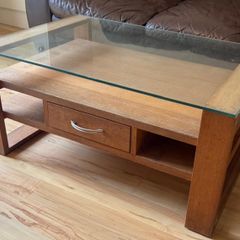 Coffee table - glass topped with shelves and 1 drawer (open to offers)