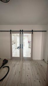 sliding doors with rail same as new..need gone as moving this weekend