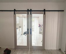 sliding doors with rail same as new..need gone as moving this weekend