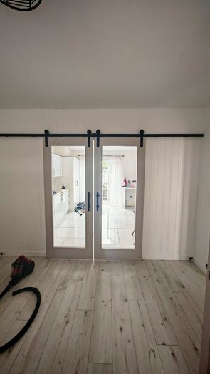 sliding doors with rail same as new..need gone as moving this weekend