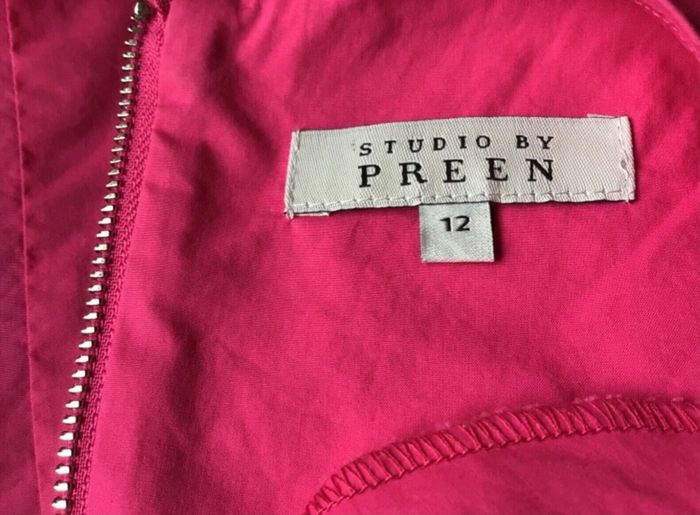 Studio preen pink & Navy embroidered short bell sleeve blouse size 12 includes postage