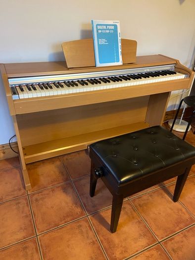 Yamaha piano and stool