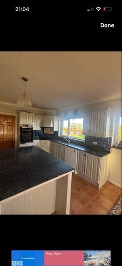 Black granite top removed from kitchen island