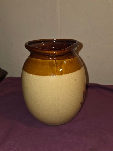 Vintage brown and tan water jug with wheat design