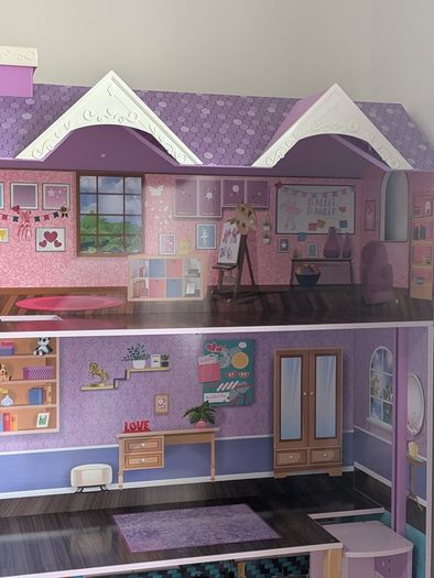 Large wooden dolls house with furniture