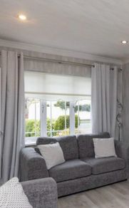 Readymade eyelet curtains with matching cushions