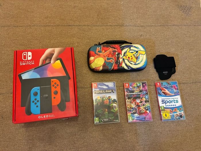 Nintendo Switch OLED bundle (with 4 Joy-Cons, 3 games)