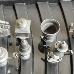 selection of seven pewter ornaments