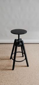 Black stool (studio photography)