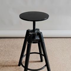 Black stool (studio photography)
