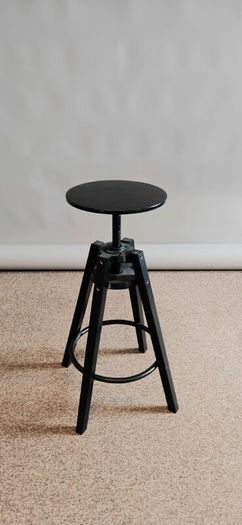 Black stool (studio photography)