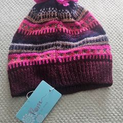 Small child's pom hat