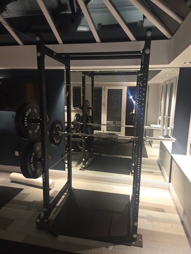 Mint condition - amazing heavy duty black squat rack with almost brand new Rock Solid barbell and bumper plates - a must see!!!