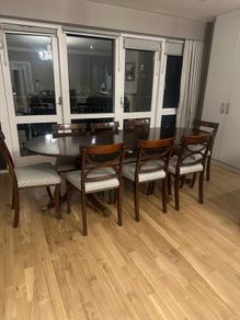Extendable mahogany dining table and 8 Reprodux chairs