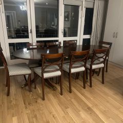 Extendable mahogany dining table and 8 Reprodux chairs