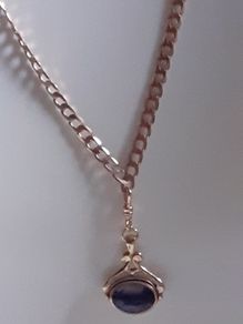 gold chain and pendants