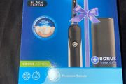 Oral B Pro 1 electric toothbrush with pressure sensor and travel case brand new