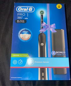 Oral B Pro 1 electric toothbrush with pressure sensor and travel case brand new