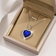 Heart Shaped Necklace with a Blue Stone