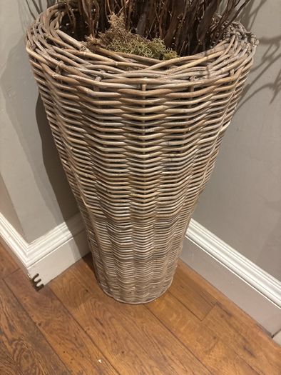 Very tall rattan planter with contorted willow